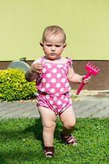 Image showing Happy cute little girl outdoor