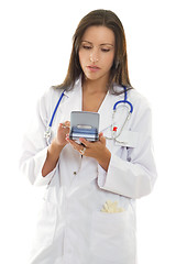 Image showing Doctor using a portable device with medical software.