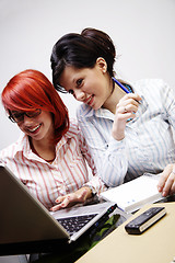 Image showing Two businesswomen are working in the office