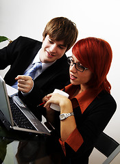 Image showing beautiful caucasian business woman with young consultant