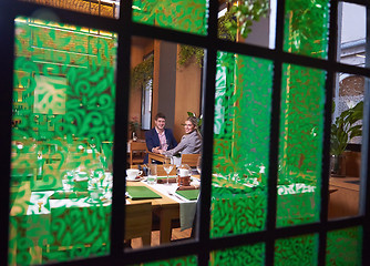 Image showing business couple having dinner