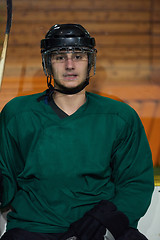 Image showing ice hockey players on bench