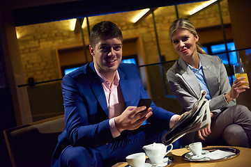 Image showing business couple take drink after work