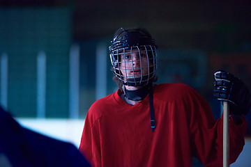 Image showing ice hockey players on bench