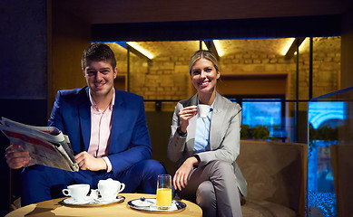 Image showing business couple take drink after work