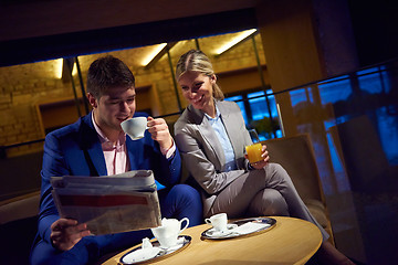 Image showing business couple take drink after work