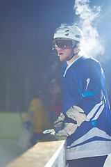 Image showing ice hockey players on bench