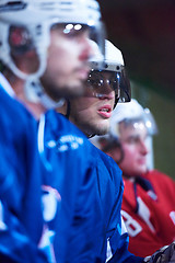 Image showing ice hockey players on bench