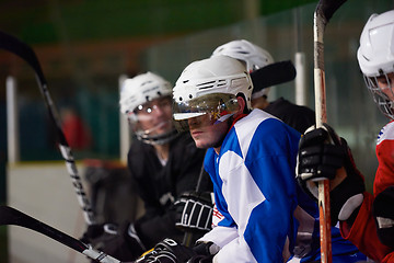 Image showing ice hockey players on bench