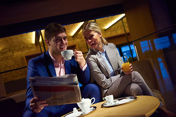 Image showing business couple take drink after work