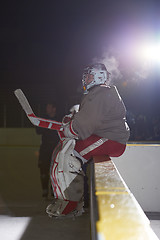 Image showing ice hockey players on bench