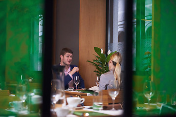 Image showing business couple having dinner