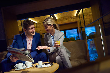 Image showing business couple take drink after work