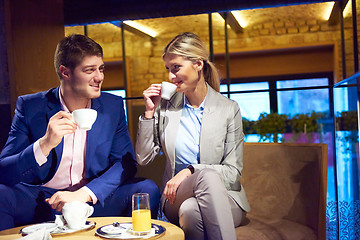 Image showing business couple take drink after work