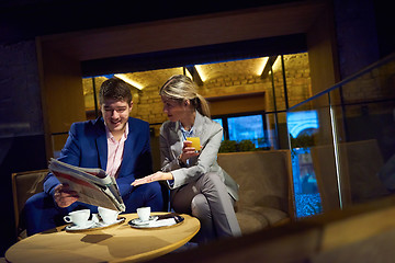 Image showing business couple take drink after work