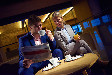 Image showing business couple take drink after work