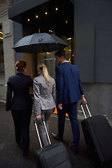 Image showing business people couple entering  hotel