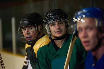 Image showing ice hockey players on bench