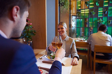 Image showing business couple having dinner