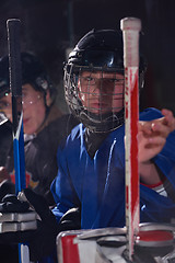 Image showing ice hockey players on bench