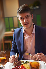 Image showing business couple having dinner