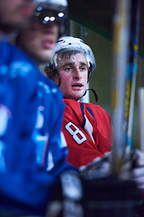 Image showing ice hockey players on bench