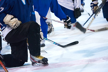 Image showing ice hockey players team meeting with trainer