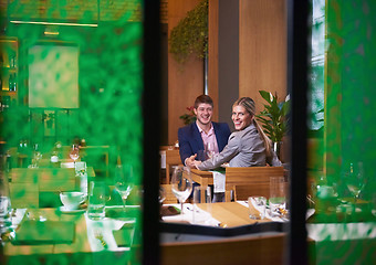 Image showing business couple having dinner