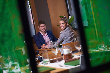 Image showing business couple having dinner