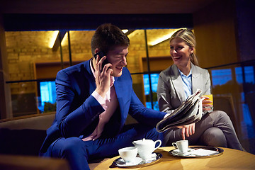 Image showing business couple take drink after work