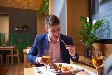 Image showing business couple having dinner