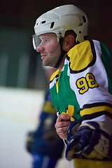 Image showing ice hockey players on bench