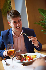 Image showing business couple having dinner