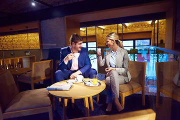 Image showing business couple take drink after work