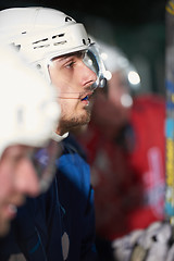 Image showing ice hockey players on bench