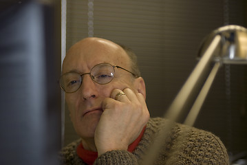 Image showing man looking at computer screen in office