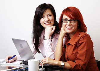 Image showing Two businesswomen are working