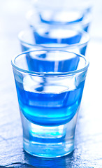 Image showing blue alcoholic drink into small glasses