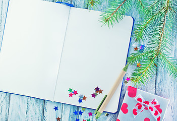 Image showing notebook and christmas decoration