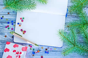 Image showing notebook and christmas decoration