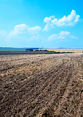 Image showing ploughed field with sky