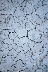 Image showing Surface of a grungy dry cracking parched earth