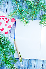 Image showing notebook and christmas decoration