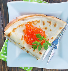 Image showing pancakes with salmon caviar