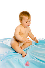 Image showing baby in diapers. Studio