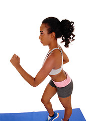 Image showing Young african american woman running.