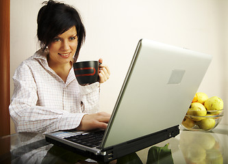 Image showing beautiful caucasian woman with laptop