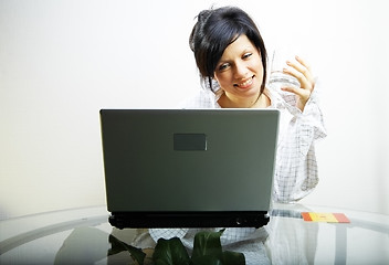 Image showing beautiful woman with laptop in mens shirt