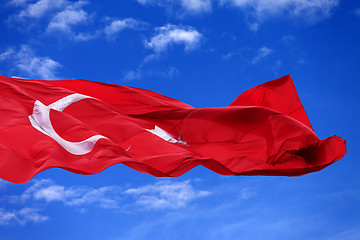 Image showing Waving flag of Turkey against blue sky