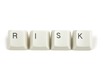 Image showing risk from scattered keyboard keys on white